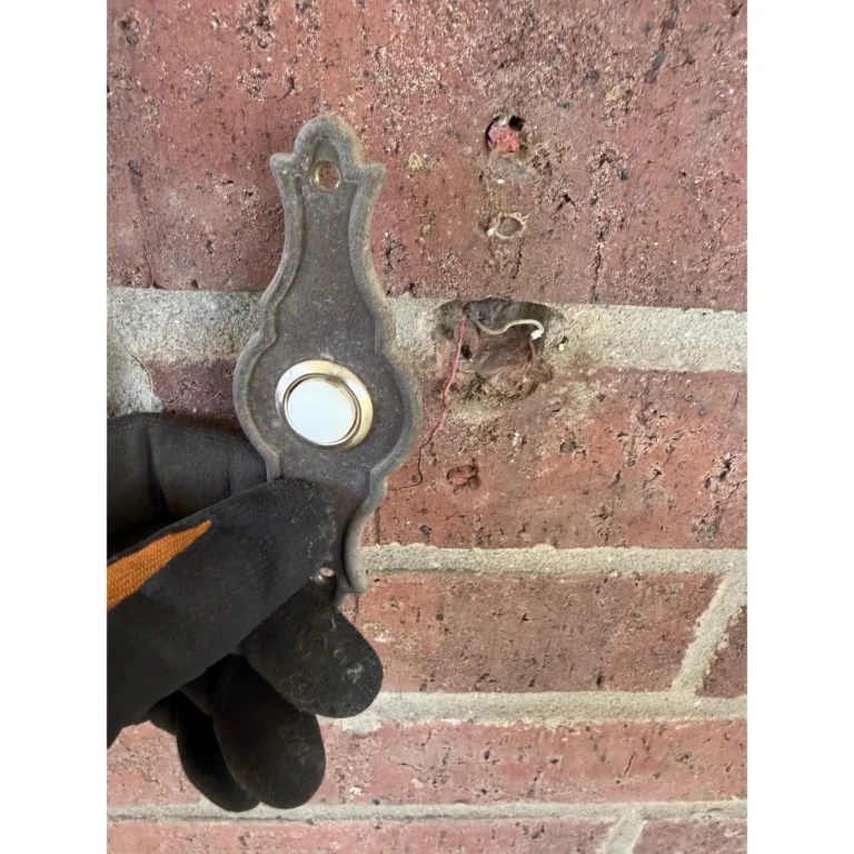 Mounting bracket preparation for an exterior low-voltage installation.