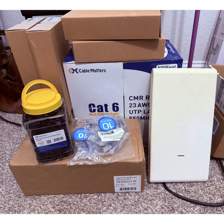 Cat6 cable and low-voltage supplies staged for structured cabling work.