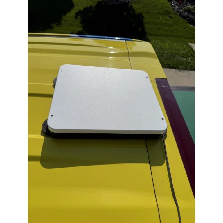 Laptop used outdoors for network or device configuration during field work.