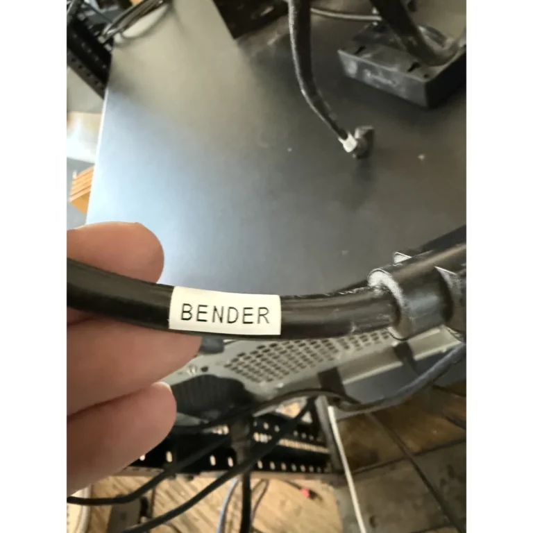 Labeled low-voltage cable connection prepared for sender and receiver wiring.