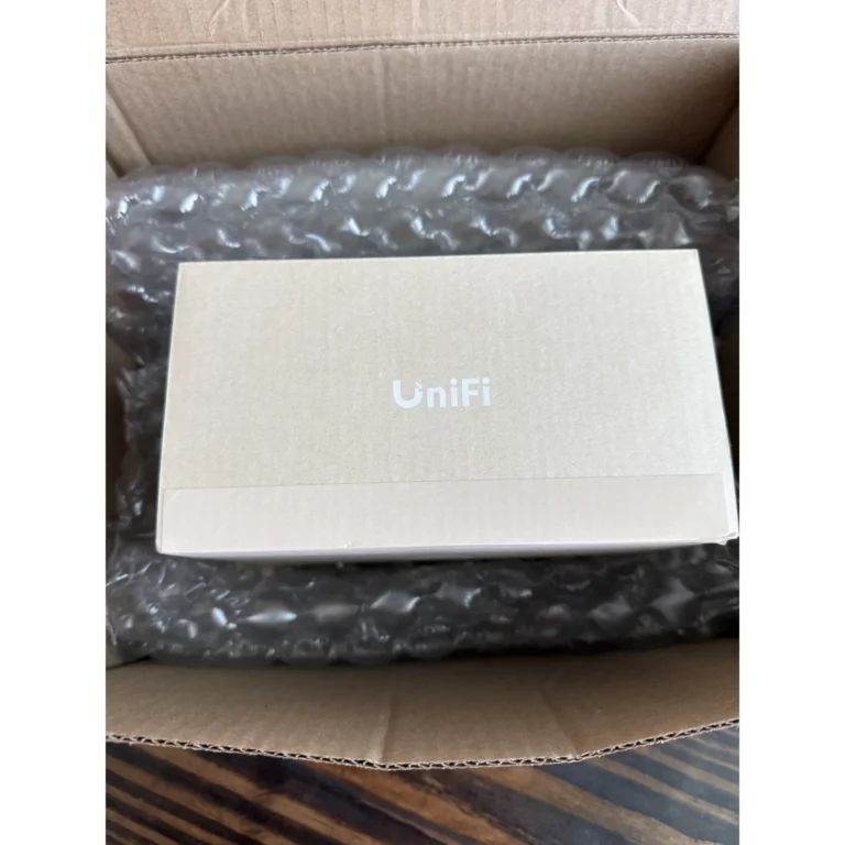 UniFi network equipment in packaging before a project install.