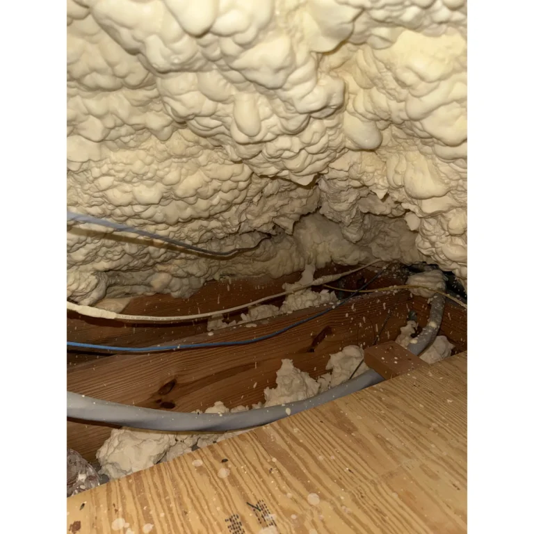 Low-voltage wiring routed through an attic or crawlspace area.