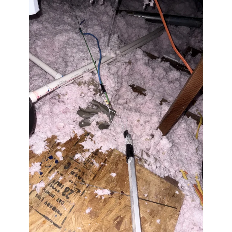 Attic wiring path used for low-voltage cabling or network runs.