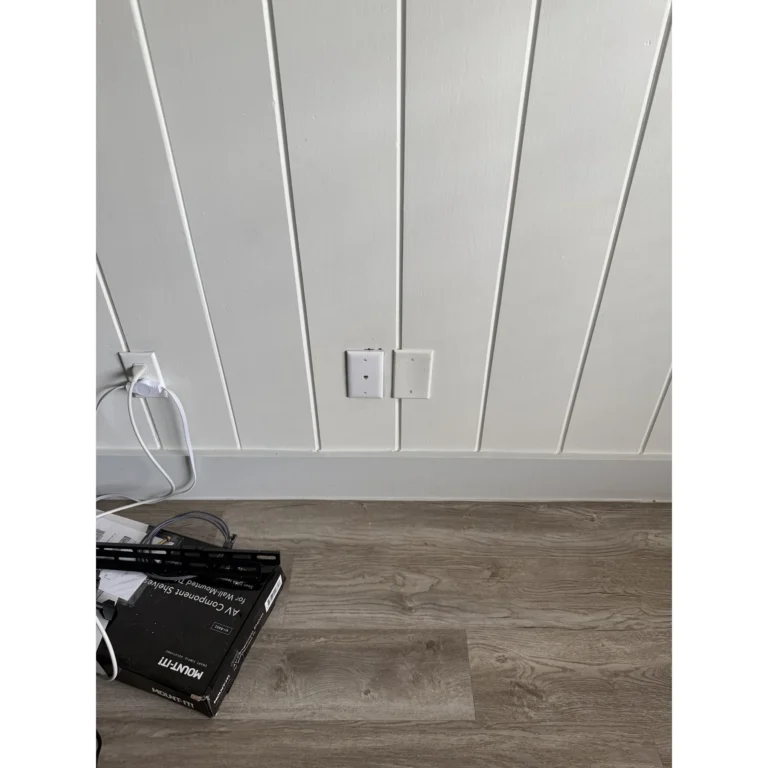 Finished wall location prepared for connected equipment or cabling.
