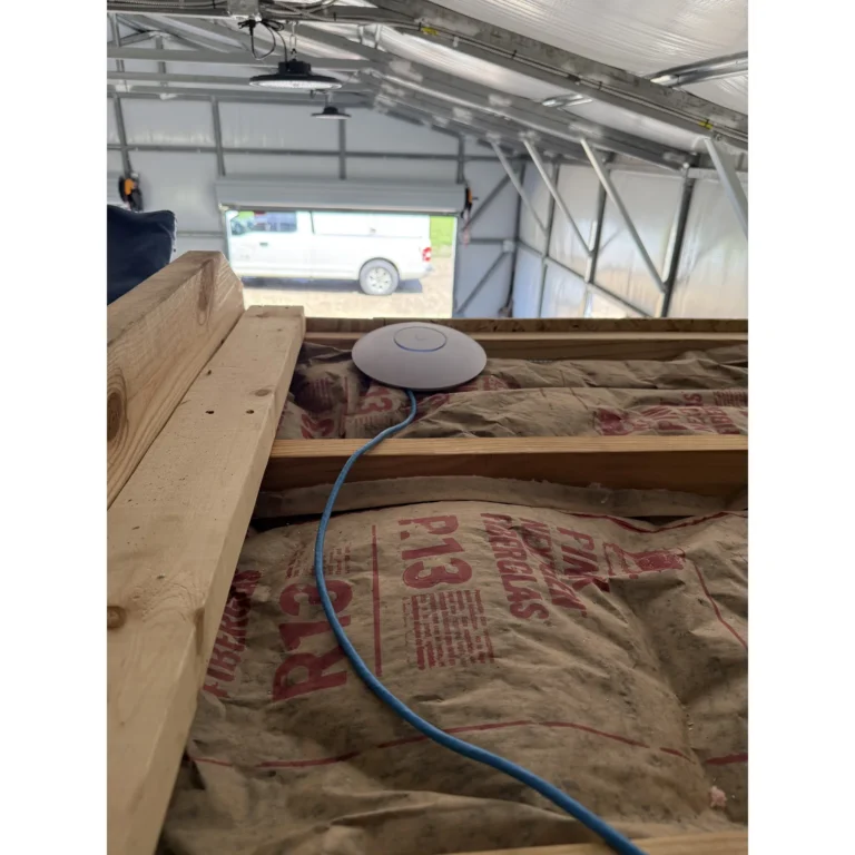 Low-voltage cable routed through framing during prewire work.