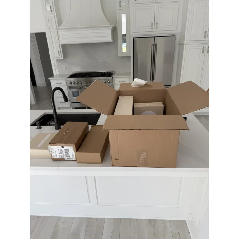 Network and low-voltage equipment staged in boxes before a Texas 67 Systems installation.
