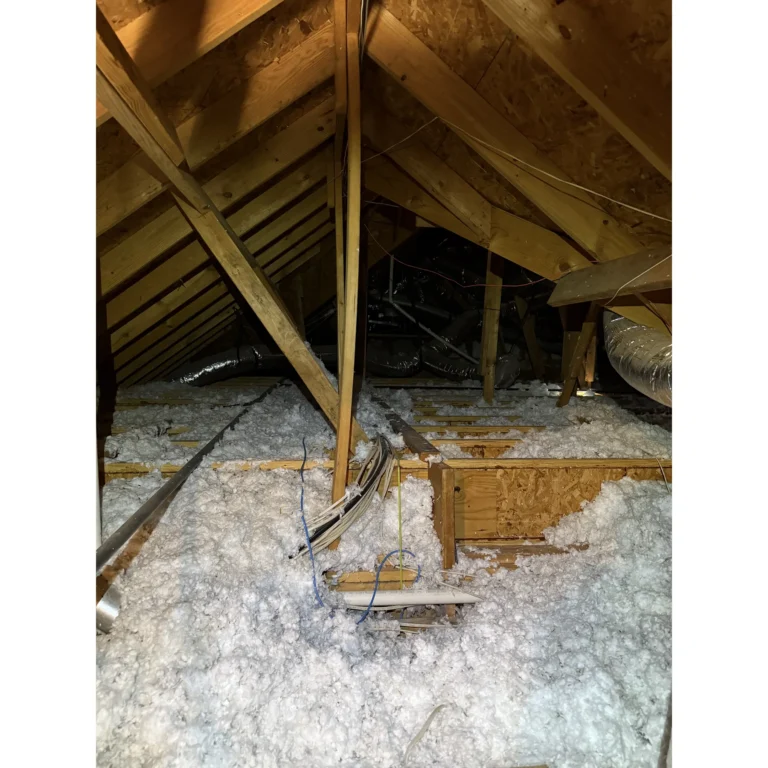 Attic wiring path reviewed for low-voltage cabling and network installation work.