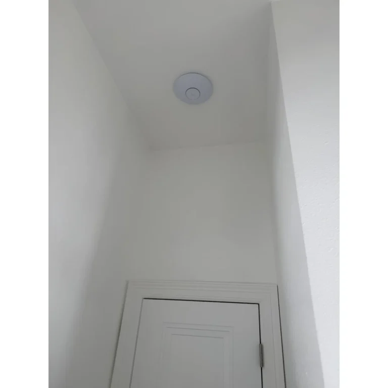 Interior ceiling device placement for a smart technology or low-voltage installation.